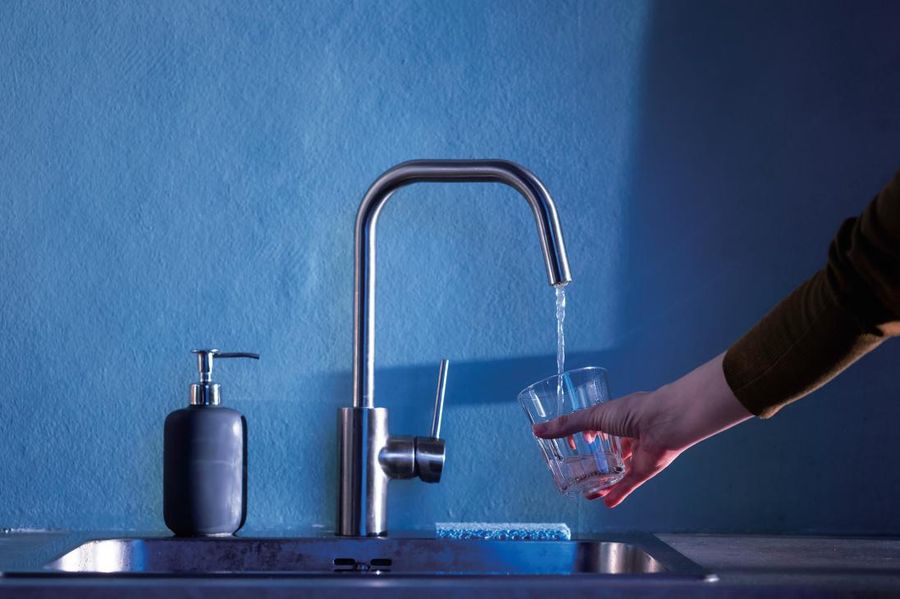 A chrome NLB kitchen tap photographed against a plain background